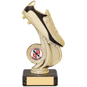 Bright gold football boot trophy on curved stand with black marble base and space for centre medallion, featuring engraving plaque