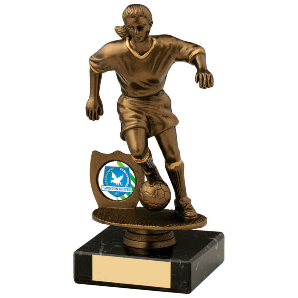 Antique gold female footballer trophy showing detailed player figurine in action pose with football, mounted on black marble base with club badge space