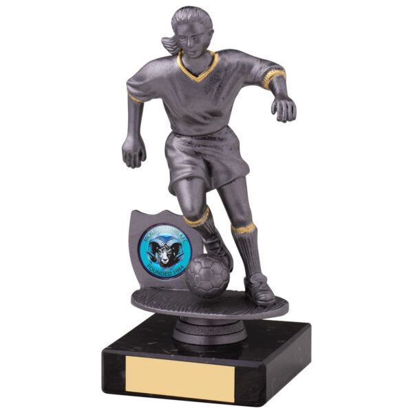 Pewter finish female footballer trophy with gold highlights showing detailed player figurine in action pose, mounted on black marble base with club badge space