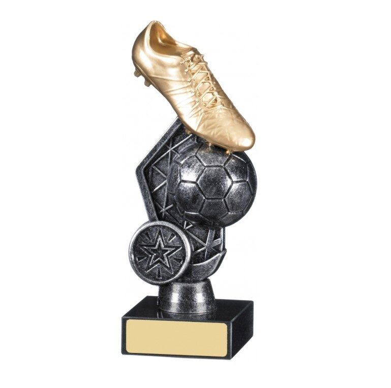 Dual-tone football trophy with silver metallic column base supporting golden football boot positioned above detailed soccer ball with star accents on black base