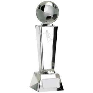 Classic crystal glass pillar award with tapered column design topped by detailed 3D football sphere on substantial crystal base