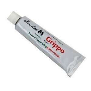 White tube of Grippo lawn bowls grip aid with red and black text branding, professional hand grip enhancer for improved bowling control