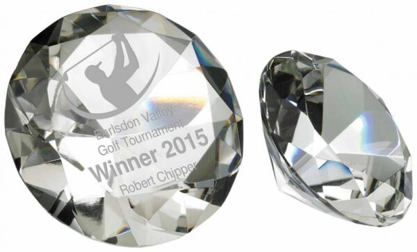 Set of two diamond-shaped crystal awards showing brilliant multi-faceted surfaces with professional laser engraving, displaying exceptional clarity and light refraction