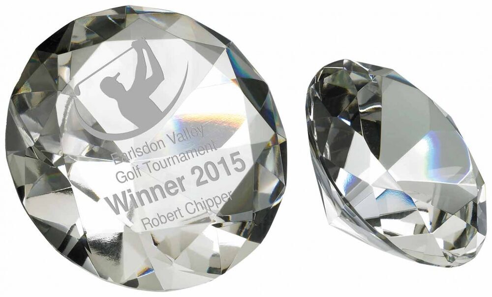 Set of two diamond-shaped crystal awards showing brilliant multi-faceted surfaces with professional laser engraving, displaying exceptional clarity and light refraction