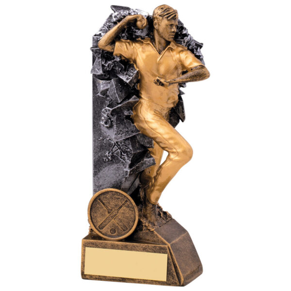 Cricket bowling trophy showing bronze and gold bowler figure in delivery pose against black shattered backdrop with cricket emblem and blank engraving plaque on weighted base