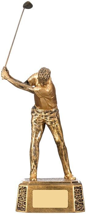Large golden golf trophy featuring detailed male golfer figure at moment of ball impact, mounted on elegant textured rectangular base with engraving plate