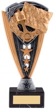 Motorsport trophy featuring detailed golden racing helmet with relief design against black and bronze wing backdrop, with silver stars and gold engraving plaque