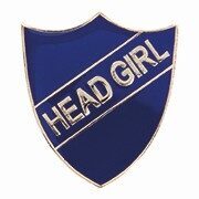 Blue shield-shaped enamel badge with white HEAD GIRL text displayed on diagonal banner, featuring secure metal pin for school uniform attachment