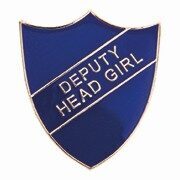Blue shield-shaped enamel badge featuring DEPUTY HEAD GIRL text in white lettering on diagonal banner, with secure metal pin fastening for uniform wear